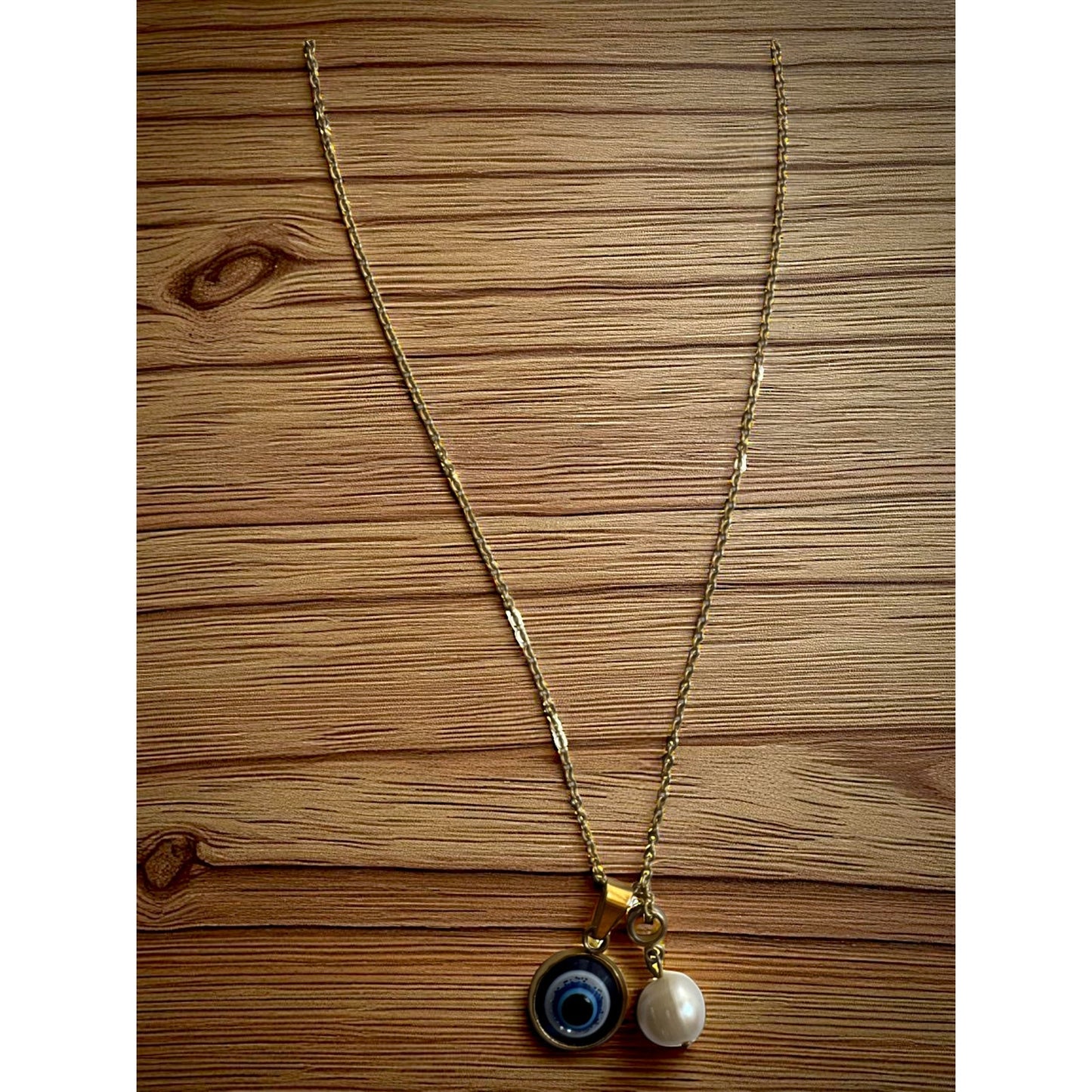 16 inch Stainless Steel Gold necklace with two charms; evil eye; pearl pendent necklace