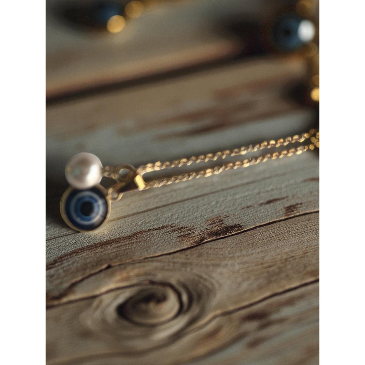 16 inch Stainless Steel Gold necklace with two charms; evil eye; pearl pendent necklace